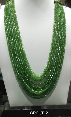 GREEN FACETED BEADS